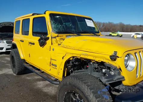2020 Jeep Wrangler Unlimited Sahara from USA, damaged, VIN 1C4HJXEN9LW125402